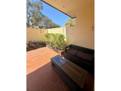 Welcome to this charming condominium located at 8785 SW 137th