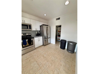 Welcome to this charming condominium located at 8785 SW 137th