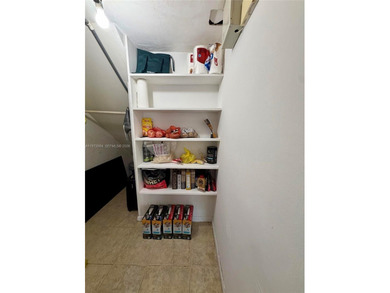 Welcome to this charming condominium located at 8785 SW 137th