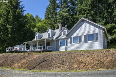 Two homes on over 7 riverfront acres! The 1983 home is 3 bedroom - photo 3