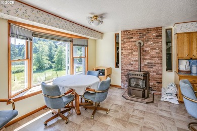 Two homes on over 7 riverfront acres! The 1983 home is 3 bedroom - photo 9