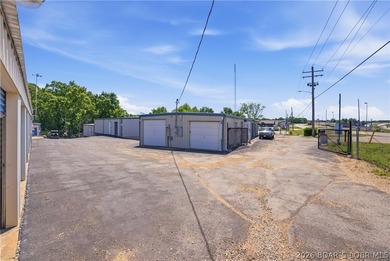 Positioned in a prime location on Osage Beach Parkway, this - photo 23
