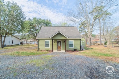 Escape to your own slice of waterfront paradise on Toledo Bend! - photo 1