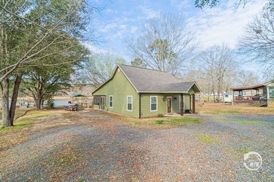 Escape to your own slice of waterfront paradise on Toledo Bend! - photo 3