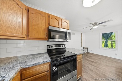 Beautifully updated 2-bedroom home sits on a nearly half-acre - photo 12
