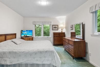 Discover this 2,800 sq ft wood clad contemporary nestled on one - photo 32