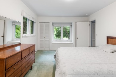 Discover this 2,800 sq ft wood clad contemporary nestled on one - photo 33