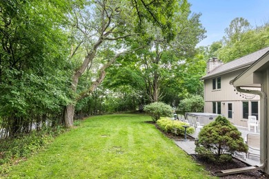 Discover this 2,800 sq ft wood clad contemporary nestled on one - photo 38