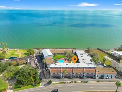 Welcome to this beautifully maintained condo located along - photo 1