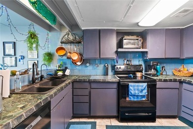 Welcome to this beautifully maintained condo located along - photo 10