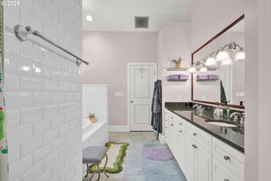 Tucked away on over an acre of wooded privacy, this custom - photo 18