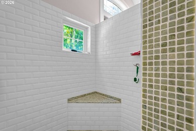 Tucked away on over an acre of wooded privacy, this custom - photo 19
