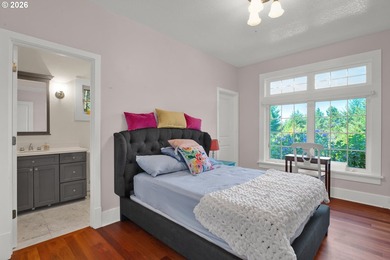 Tucked away on over an acre of wooded privacy, this custom - photo 24