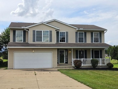 Nestled in a quiet, private lake community, this charming - photo 2