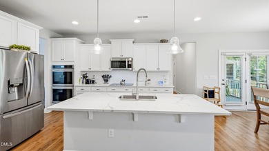 NEW PRICE! POND VIEWS! BUILT IN 2023! MOVE-IN READY! Seller is - photo 4