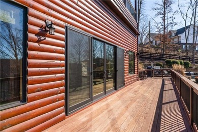 Custom luxury mountain-style home on Lake Lanier, located in the - photo 12