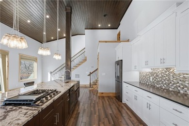 Custom luxury mountain-style home on Lake Lanier, located in the - photo 13