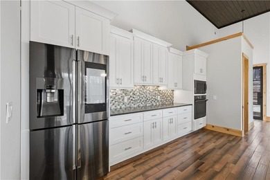 Custom luxury mountain-style home on Lake Lanier, located in the - photo 18