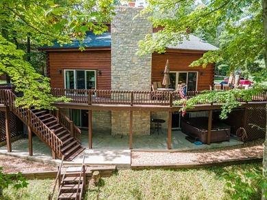 This visually stunning, premier lakefront log home on a - photo 4