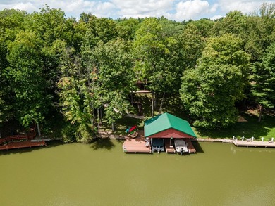 This visually stunning, premier lakefront log home on a - photo 8