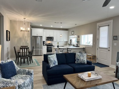Wake up to coastal breezes and water views in this beautiful - photo 11