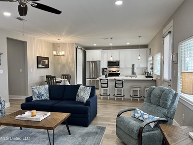 Wake up to coastal breezes and water views in this beautiful - photo 12