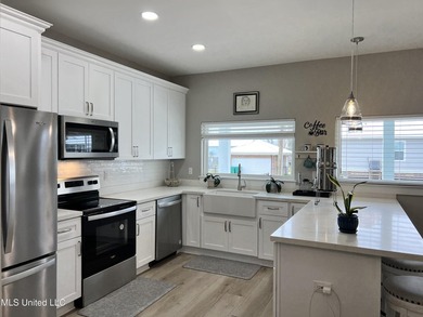 Wake up to coastal breezes and water views in this beautiful - photo 14