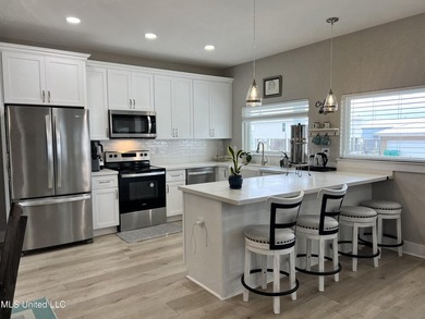 Wake up to coastal breezes and water views in this beautiful - photo 15