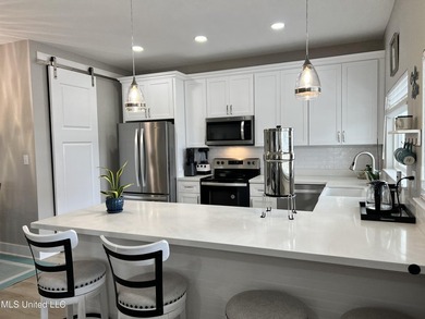 Wake up to coastal breezes and water views in this beautiful - photo 20