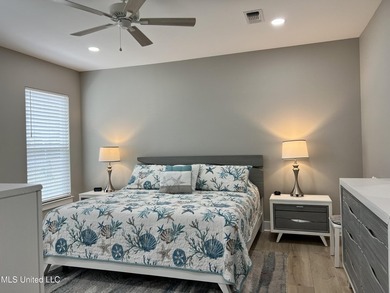 Wake up to coastal breezes and water views in this beautiful - photo 23
