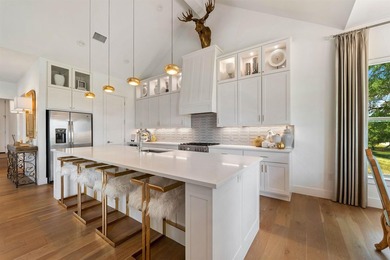 Experience elevated golf course living in this exceptional - photo 11