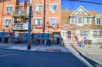 A solid, all-brick attached three story building with three - photo 1
