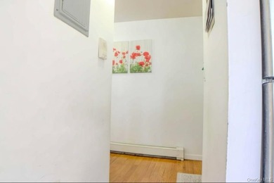 A solid, all-brick attached three story building with three - photo 6