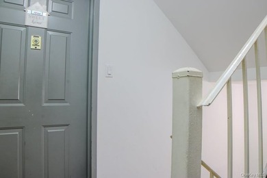 A solid, all-brick attached three story building with three - photo 8