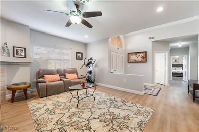 A rare single-story townhome in the gated Promenade at the