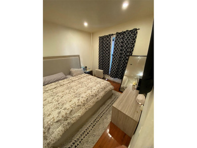 Renovated 1-bedroom, 1-bath co-op featuring a bright living and - photo 15