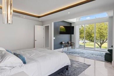 ENJOY BAY HILL GOLF COURSE LIVING AT ITS FINEST! Welcome to the - photo 16