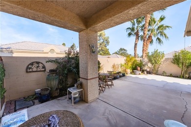A rare single-story townhome in the gated Promenade at the