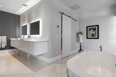 ENJOY BAY HILL GOLF COURSE LIVING AT ITS FINEST! Welcome to the - photo 18