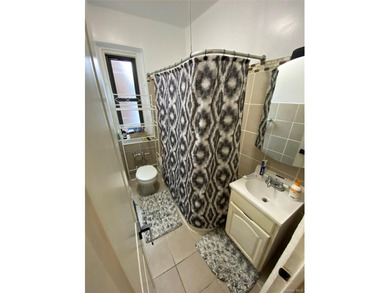 Renovated 1-bedroom, 1-bath co-op featuring a bright living and - photo 18