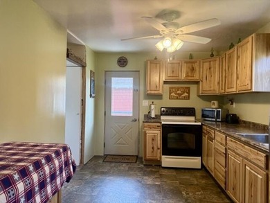 **Lakefront Property! ** This charming home is situated on an - photo 2