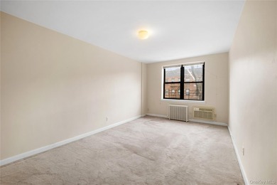 Spacious and well-maintained 1-bedroom, 1-bath co-op in the - photo 3