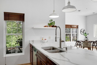 Welcome home to Unit 101 at Greenway Terrace Condominiums, where - photo 13