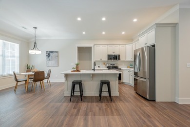 This new, one-level home is situated on .75+/- acres, built with - photo 11