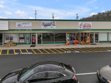For the first time ever, this well-maintained shopping center is - photo 11