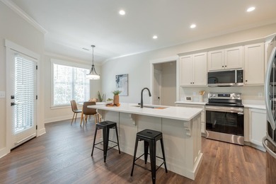 This new, one-level home is situated on .75+/- acres, built with - photo 12