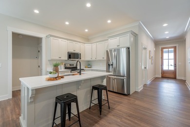This new, one-level home is situated on .75+/- acres, built with - photo 13