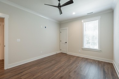 This new, one-level home is situated on .75+/- acres, built with - photo 27