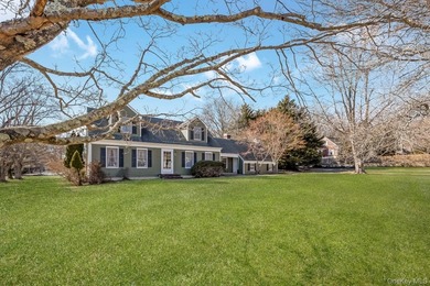 Welcome home to this inviting Colonial-style 4-bedroom oasis in - photo 3