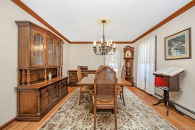 Welcome home to this inviting Colonial-style 4-bedroom oasis in - photo 5